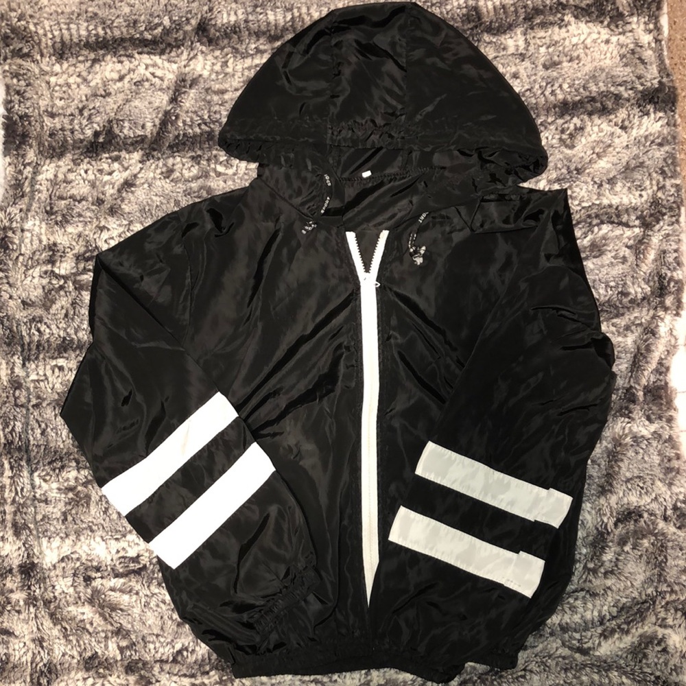 very thin windbreaker. never worn.